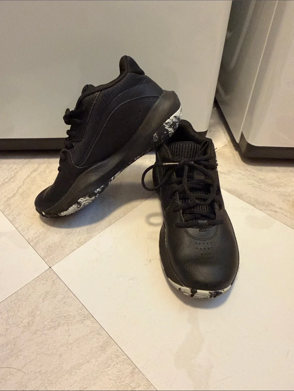 Kids Under Armour Black Athletic Sneakers with Marble Accent